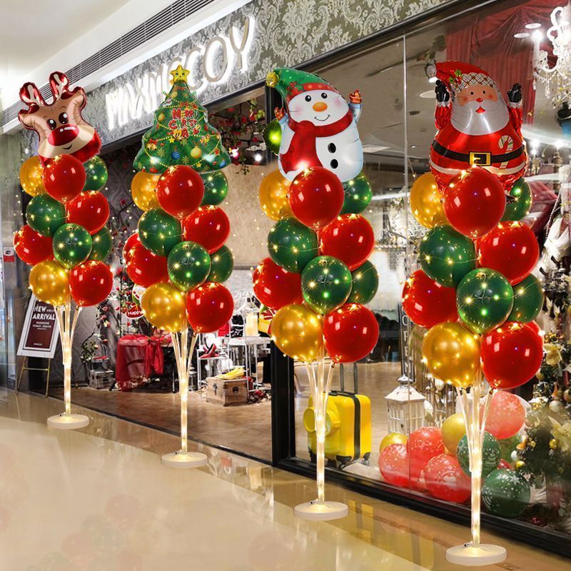 ร้านคริสต์มาสประตูบรรยากาศวันหยุดแต่งตัวฉากตกแต่งร้านขายเครื่องประดับห้างสรรพสินค้าคอลัมน์บอลลูนลอยต