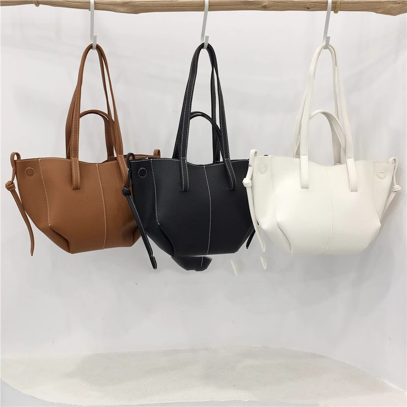 Niche bags Wings Bag 0 เวอร์ชั่นเกาหลี Tote Bag ความจุขนาดใหญ่ One Shoulder Underarm Bag แบบพกพากระเ