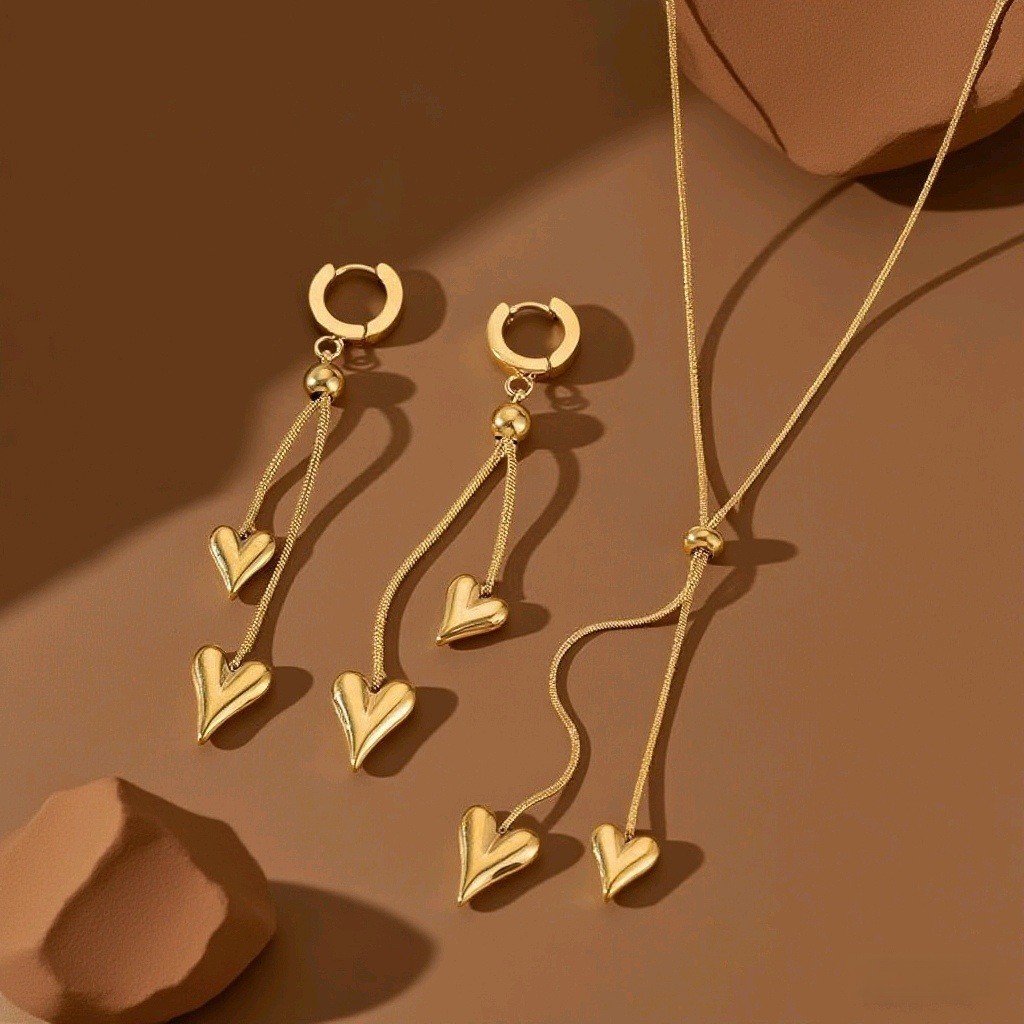 8 ️ ⃣ ซอก หรูหราไทเทเนียมเหล็กหัวใจสร้อยคอระดับไฮเอนด์ต่างหูพู่ดีงามสูทปรับพู่งูโซ่กระดูกหญิง 25.11.