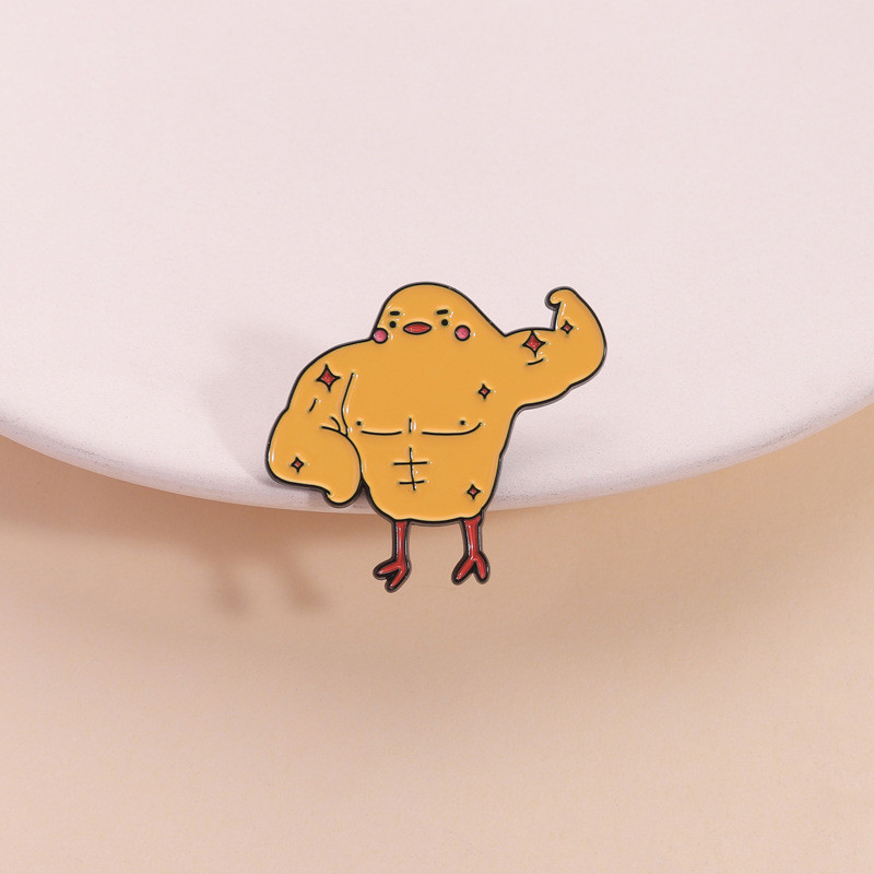เข็มกลัดน่ารัก ลายตรากล้ามเนื้อและไก่สีเหลือง