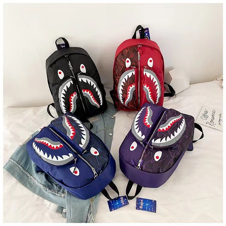Shark กระเป๋านักเรียน bape กระเป๋าเป้สะพายหลังนักเรียน Graffiti ผู้ชายผู้หญิงกระเป๋าเป้สะพายหลัง Sha