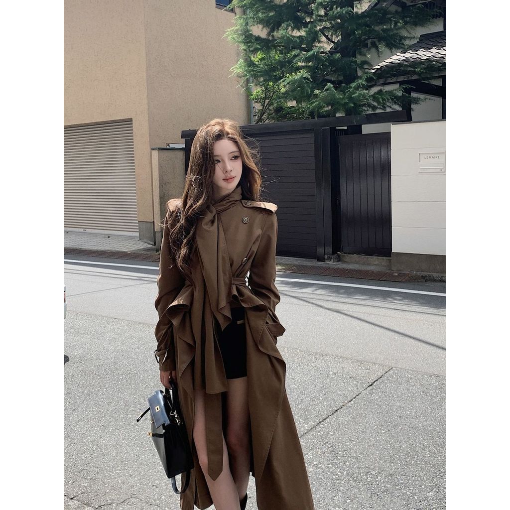 Autumn new British style temperament high sense irregular windbreaker coat female holiday style atmo