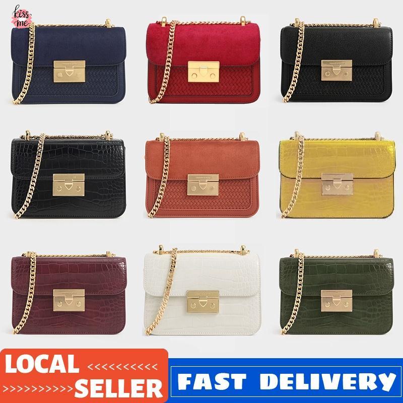 กระเป๋าสะพายข้างแบบบ็อกซียาว สายโซ่คล้องคอ.Push-Lock ปิดกระเป๋า ทรงหรูหราจาก CNK