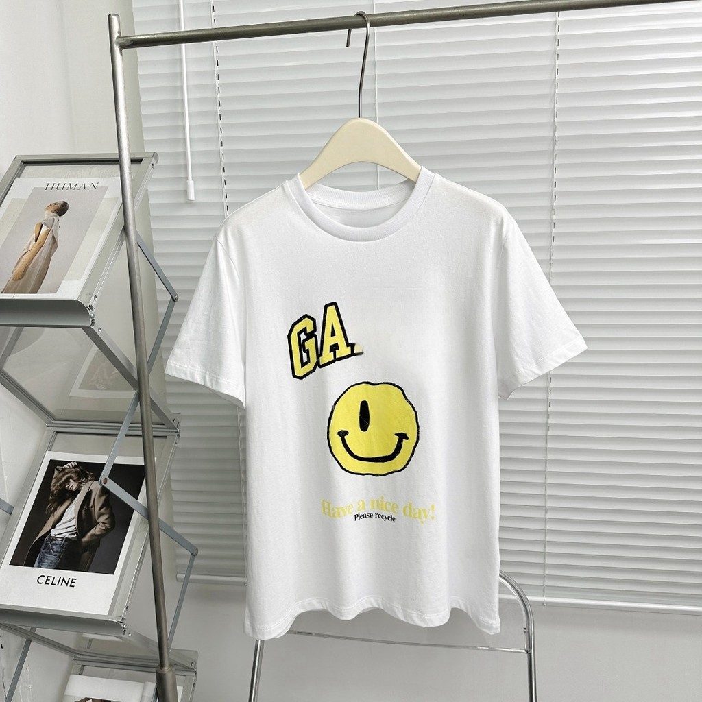 3PQA GANNI 2024 ฤดูใบไม้ผลิฤดูร้อนสไตล์ใหม่ตัวอักษรคลาสสิกสีเหลือง Distressed พิมพ์ยิ้มรอบคอหลวมแขนส