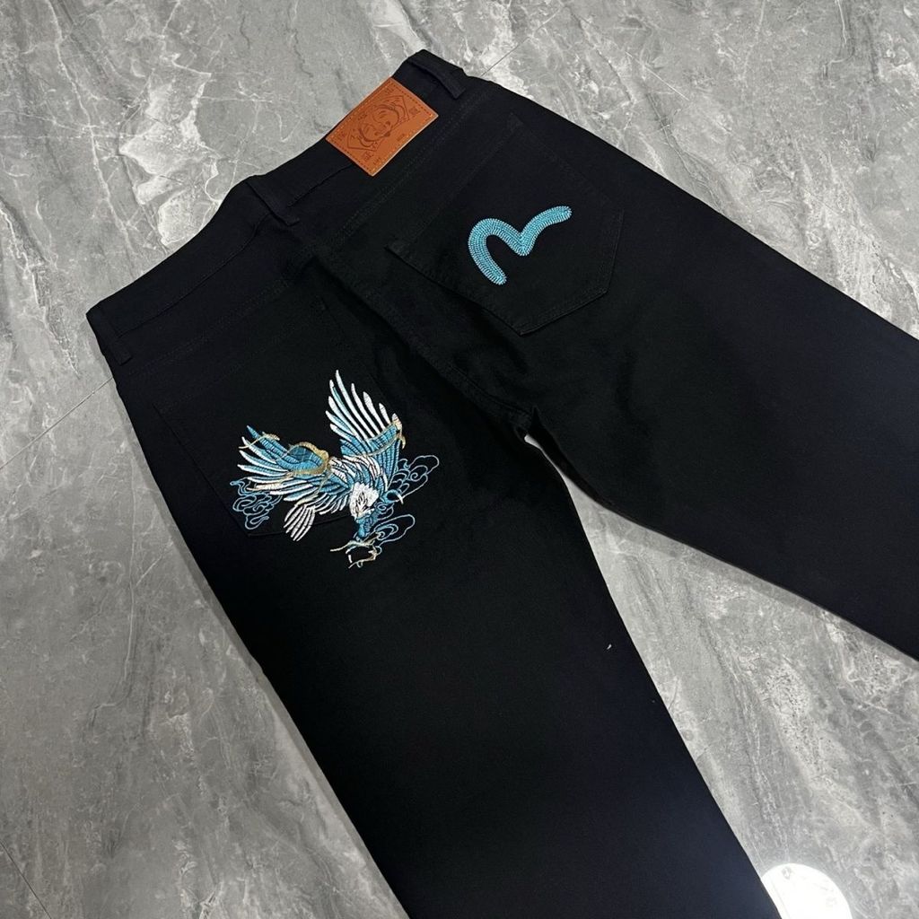 กางเกงยีนส์ทรงหลวมผู้ชาย แบบปักลาย Evisu Peace Pigeon