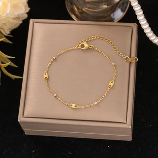 สร้อยข้อมือเหล็กไทเทเนียม ลายเส้นแบบ 18K Gold แฟชั่นสำหรับผู้หญิง พร้อมขายส่ง