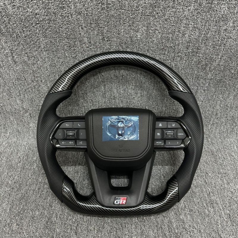 Toyota Domineering Cool Luze ดัดแปลง lc300 พวงมาลัย GR กีฬาคาร์บอนไฟเบอร์มัลติฟังก์ชั่น Henland Alph