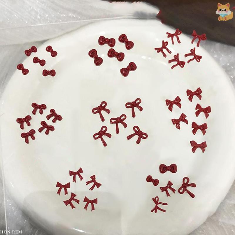 [VI] 100PCS 3D Nail Art Red Bow Charms อุปกรณ์อุปกรณ์เสริมชิ้นส่วนเรซินสําหรับเล็บ Decorastion ผลิตภัณฑ์ตกแต่งเล็บวัสดุเครื่องมือ TH ราคา ถูกที่สุด ดีลบีเคเค