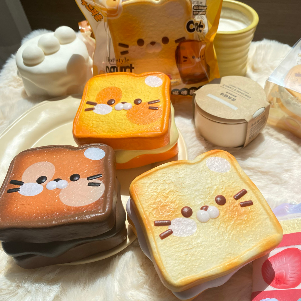 สกุชชี่หนึบ คลายเครียด Cs โยเกิร์ตแมวขนมปังปิ้งช้า Rebound ของเล่นหยิกเพลง Decompression Vent squish