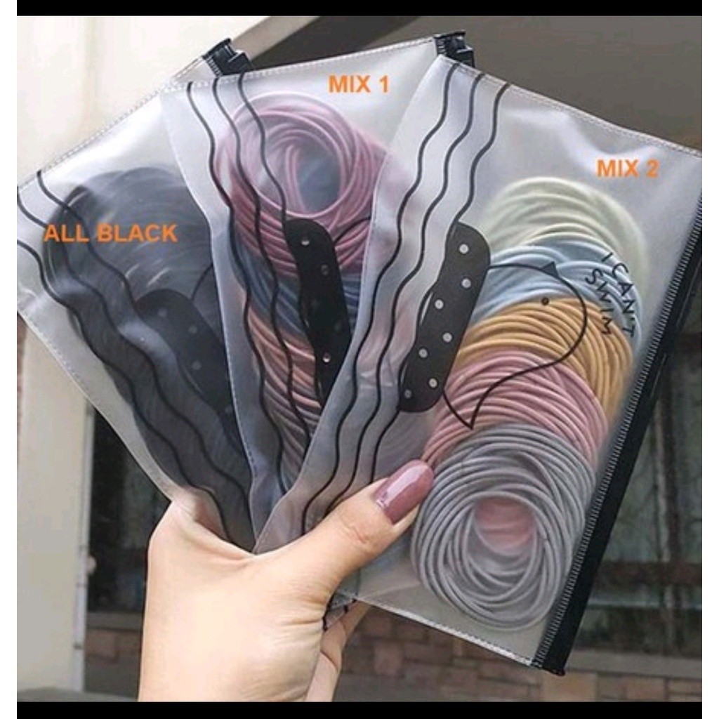 ยางรัดผมสไตล์เกาหลี 100 ชิ้น + กระเป๋า DMO F17