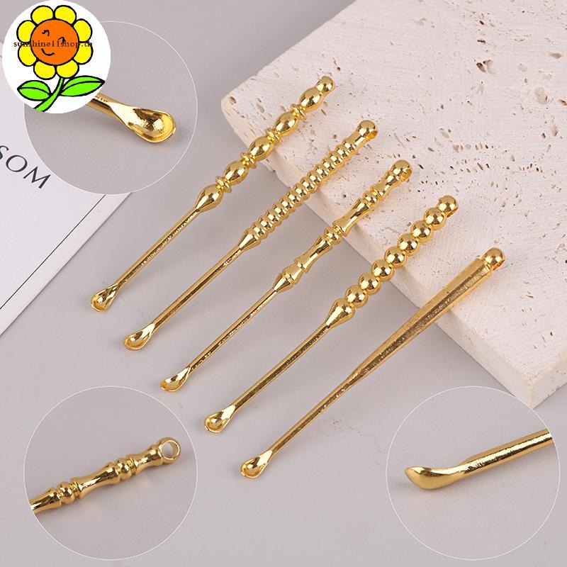 SUNSHOP Ear Pick Ear Curette Cleaner กําจัดขี้หูเครื่องมือทําความสะอาดช้อนหูทองเหลืองแบบพกพาทําความส