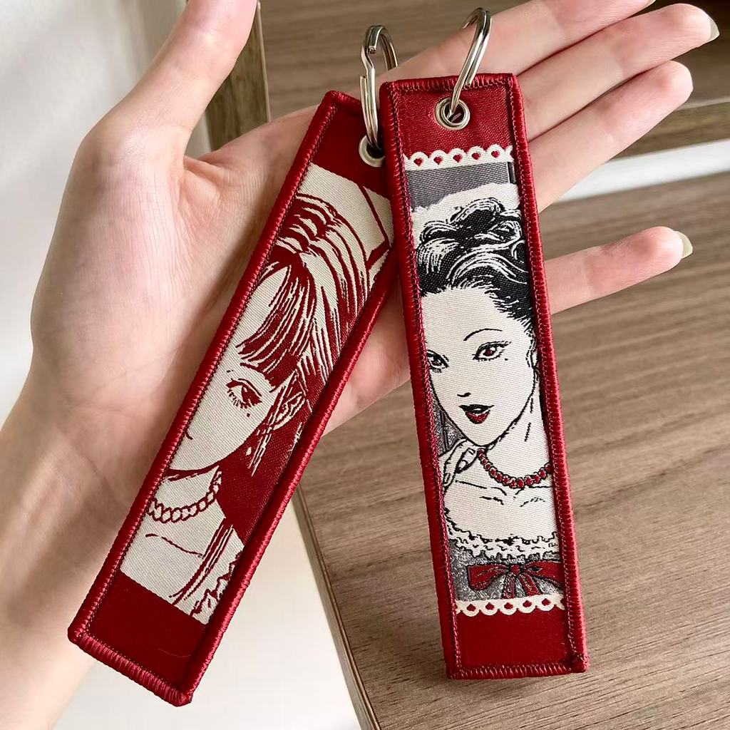 การ์ตูนญี่ปุ่น Ito Junji Miss Tomie สองด้านเย็บปักถักร้อยจี้ผ้าพวงกุญแจอุปกรณ์เสริมกระเป๋าเครื่องประ