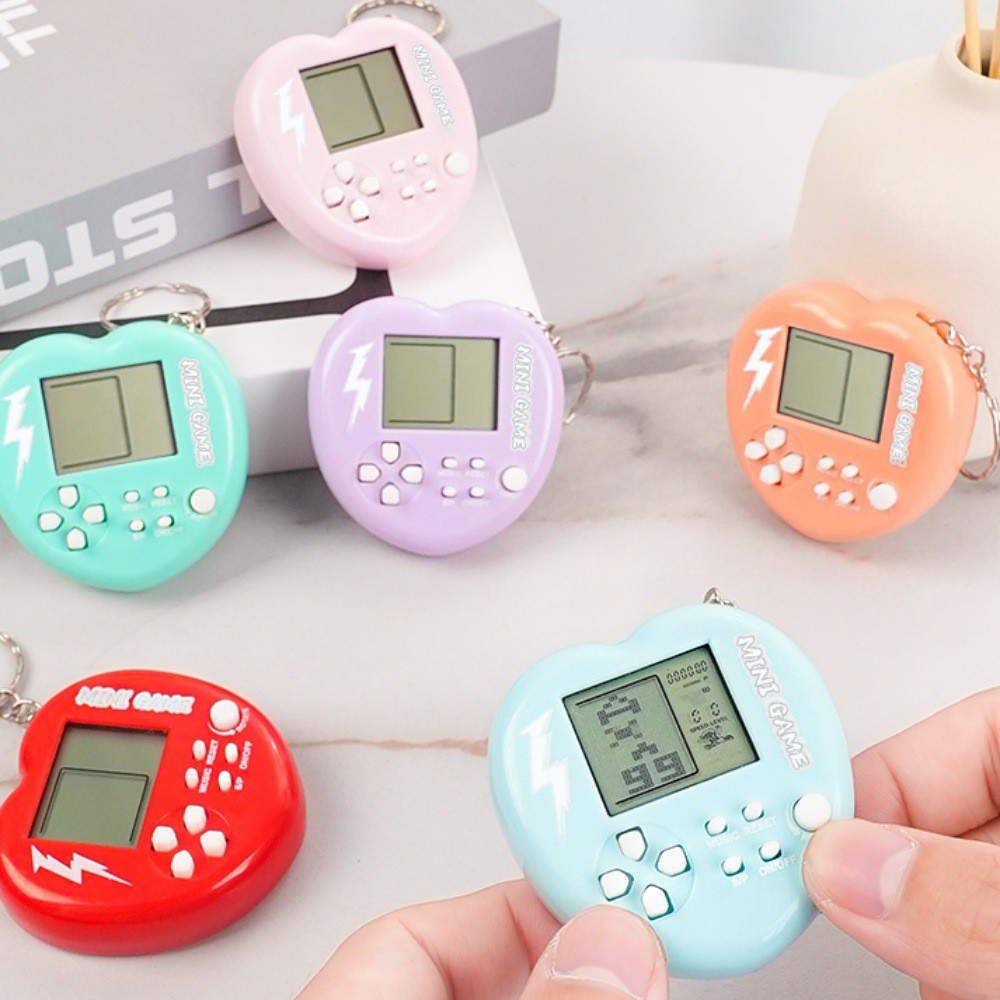 อุปกรณ์พิเศษ Love Peach Shape Handheld Mini Tetris เกมพวงกุญแจ