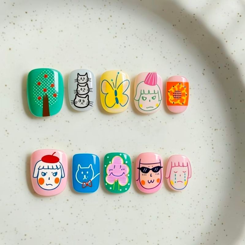เล็บปลอม10ชิ้น [กราฟฟิตีเด็ก] รูปแบบการ์ตูนที่มีสีสันมีชีวิตชีวาขี้เล่นน่ารักเหมาะสาวแต่งเล็บที่ถอดออกได้แพทช์ฟรีกาวกดบนเล็บ