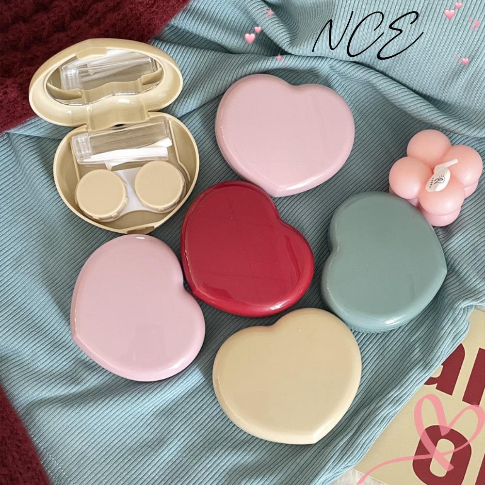 กล่องคอนแทคเลนส์ NCE แบบพกพา ดีไซน์หัวใจ มาพร้อมชุดเครื่องมือและแว่นคีบกระจก สำหรับการใช้งานที่สะดวก