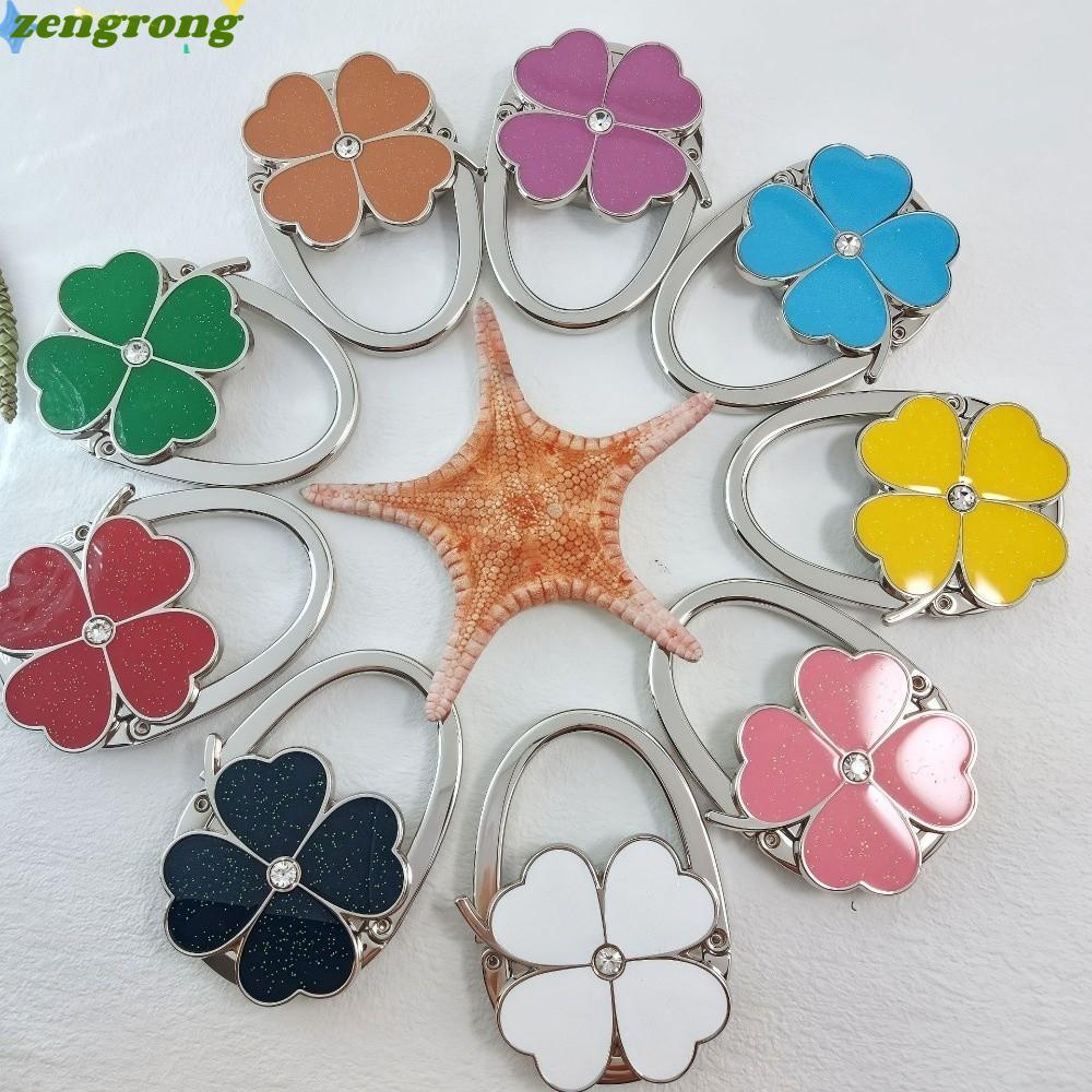 ZENGRONG ที่แขวนกระเป๋า, ตะขอแขวนกระเป๋าถือโคลเวอร์สี่ใบแบบพับได้สําหรับผู้หญิง, ที่แขวนกระเป๋าแบบพกพาที่ทนทานสร้างสรรค์สําหรับโต๊ะ