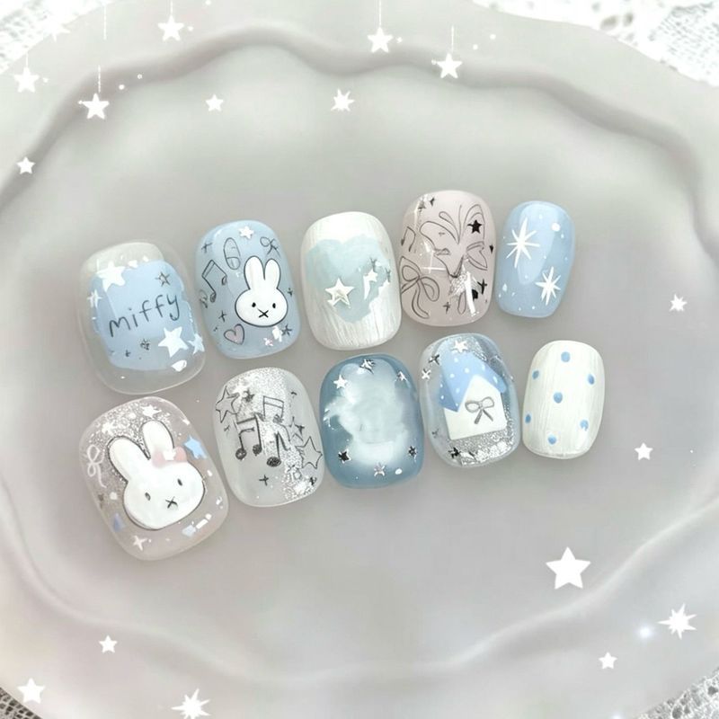 เล็บปลอม10ชิ้น[ดาวสีฟ้ามิฟฟี่]น้ําแข็งใสสีฟ้าอ่อนรอยเปื้อนจับคู่น่ารักมิฟฟี่กระต่ายดาวบันทึกที่ถอดออกได้เล็บแพทช์กดประเภทเล็บปลอมฟรีกาว