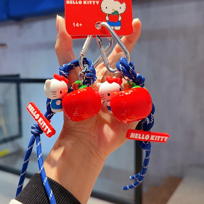 ของแท้ Sanrio Hello Kitty Apple พวงกุญแจตุ๊กตา/การ์ตูนคริสต์มาสคริสต์มาสอีฟจี้ของขวัญเล็กๆ