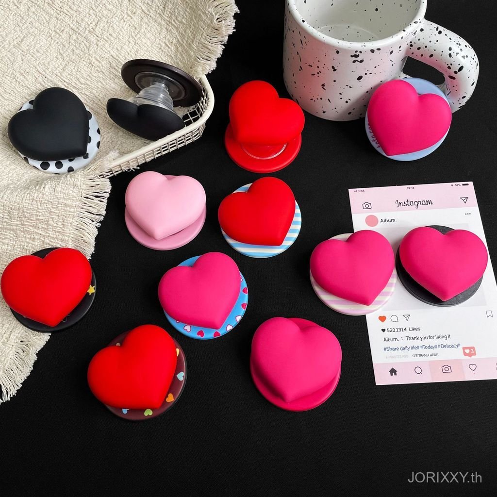 เวอร์ชั่นเกาหลี ins Pink Love Heart สามมิติ Niche Design ถุงลมนิรภัยแม่เหล็กที่วางโทรศัพท์มือถือ Lazy Desktop Watch Drama All-Match