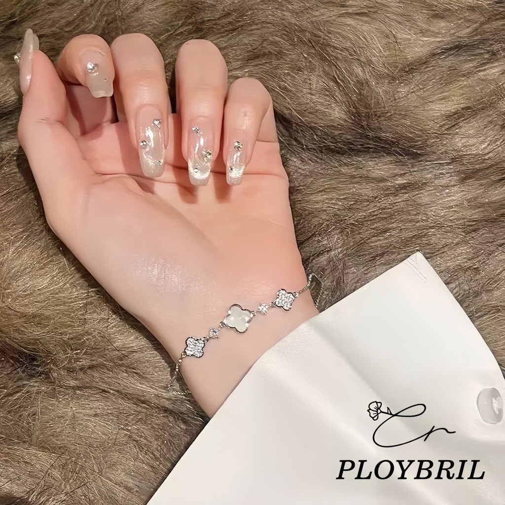 PLOYBRIL สร้อยข้อมือสี่ใบโคลเวอร์เชือกดึงฝังเพชรไม่ตกสีสไตล์เกาหลีระดับไฮเอนด์หรูหราแฟชั่นเครื่องประดับอเนกประสงค์ S005