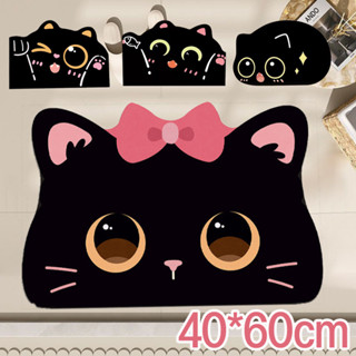 เป็นพรมห้องน้ำ ที่มีรูปหน้าแมวดำ ดินไดอะตอม กันลื่น นุ่มทนทา…
