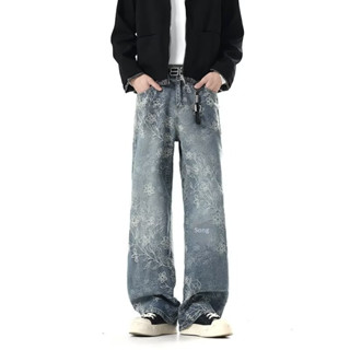 กางเกงยีนส์ลายดอกไม้แบบแจ็กการ์ดสำหรับผู้ชาย มีการออกแบบให้ข…