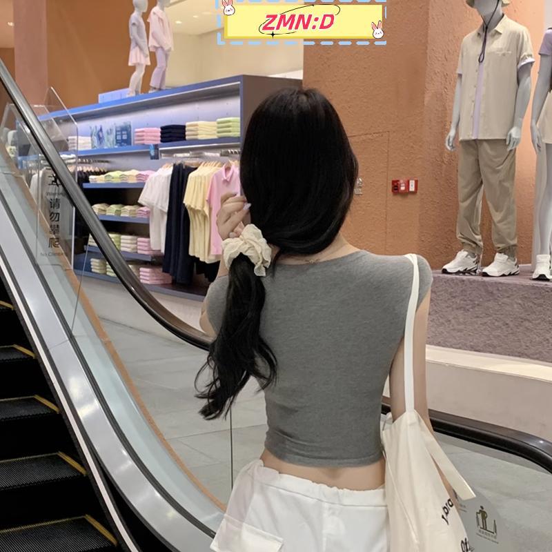ZMN:D แฟชั่นผู้หญิงสีทึบรอบคอไหล่ตรงเสื้อยืดแขนสั้น RRT
