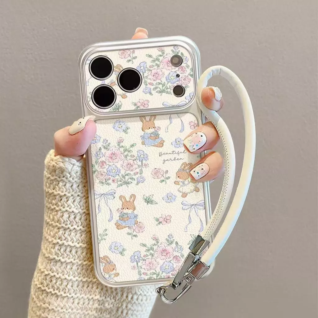 เคสโทรศัพท์ลายกระต่ายและดอกไม้ ใช้ได้กับ iPhone 13/11/12/17/14/15Plus/16ProMax ผลิตจากหนังแท้คุณภาพสูง กันกระแทกและทนทาน