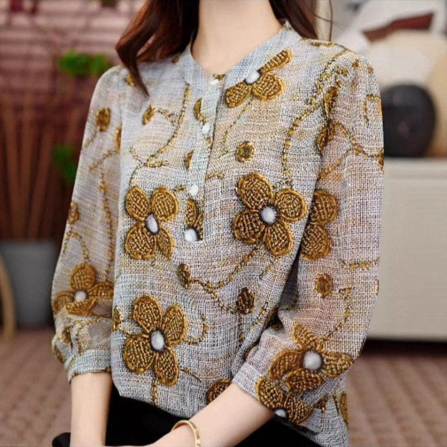 เสื้อคอรอบแขนสามส่วน ดีไซน์คลาสสิกและทันสมัยสำหรับผู้หญิง气质圆领印花七分袖衬衫女 2025洋气百搭减龄上衣