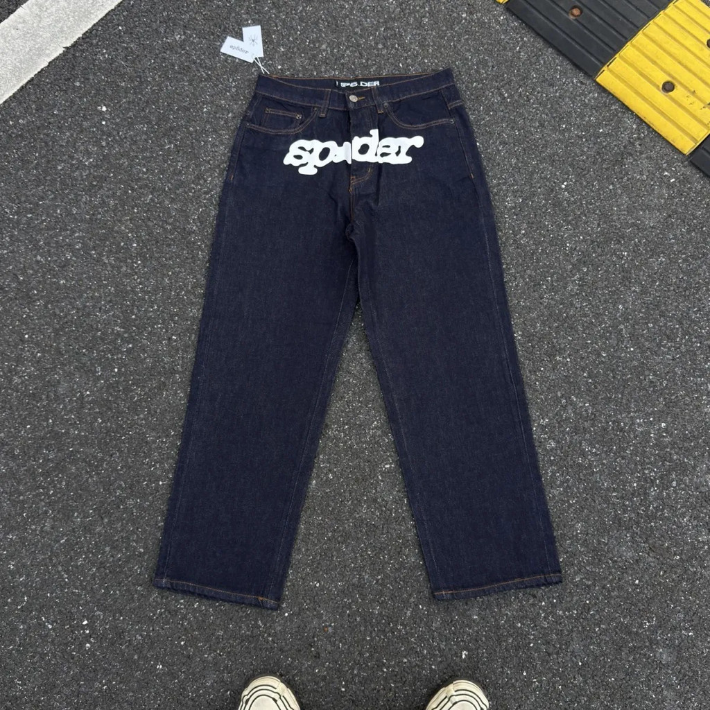 Sp5der กางเกงยีนส์ลําลองพิมพ์ลาย Washed Distressed