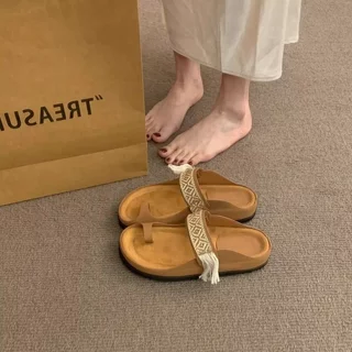 Bohemian สไตล์ชาติพันธุ์รองเท้าแตะสีน้ําตาล Webbing พู่ Flip-Flops Casual All-Match รองเท้าผู้หญิง