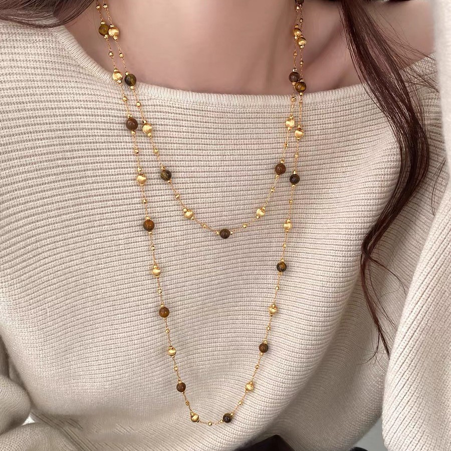 Amber Streamer Double Layer Stacked Tiger Eye สร้อยคอผู้หญิง 2025 หรูหรา Niche ยาวเสื้อกันหนาว vfr12