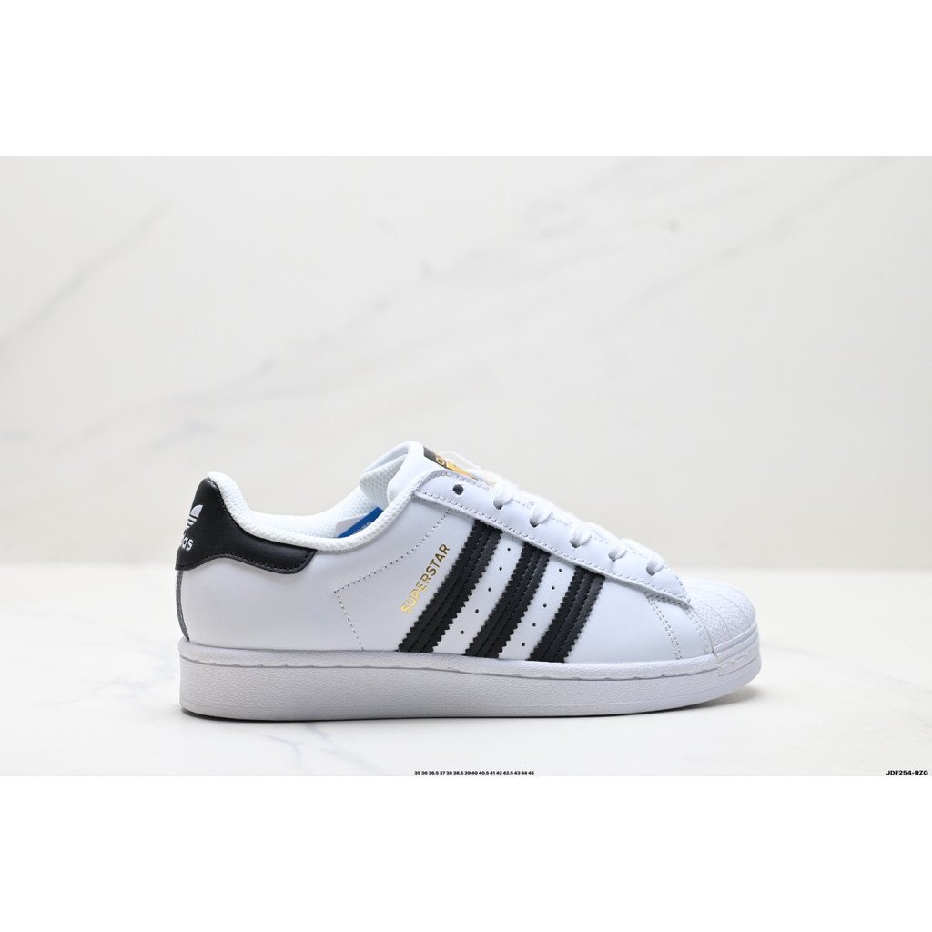 2026 สไตล์ใหม่ Adidas Originals Superstar รองเท้าผ้าใบรองเท้าผู้ชายรองเท้าผู้หญิง Joint สไตล์แบน All