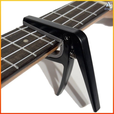 Arixen พร้อมแผ่นซิลิโคนสําหรับกีตาร์ไฟฟ้าอะคูสติกทริกเกอร์ Tension Adjustable Capo สําหรับคลาสสิก