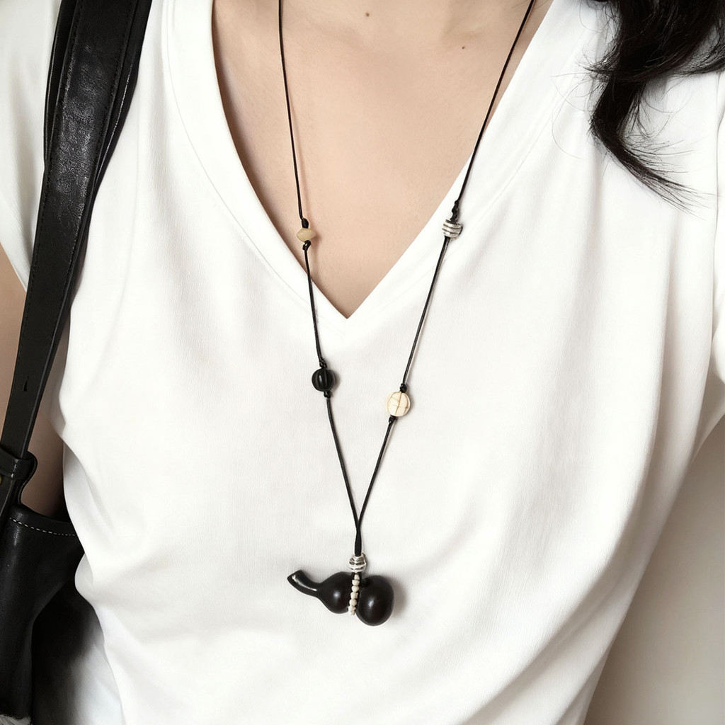 ลูกปัจญ์สร้อยคอมุกและเครื่องประดับเสื้อกันหนาว retro ebony gourd สำหรับผู้หญิง