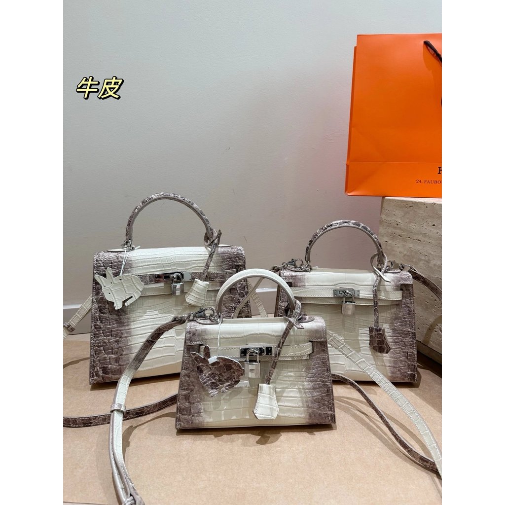 H กระเป๋าหญิง Kelly หิมาลัยหัวเข็มขัดเงินลายจระเข้ Cowhide Kelly กระเป๋ากระเป๋าถือไหล่กระเป๋า Messen