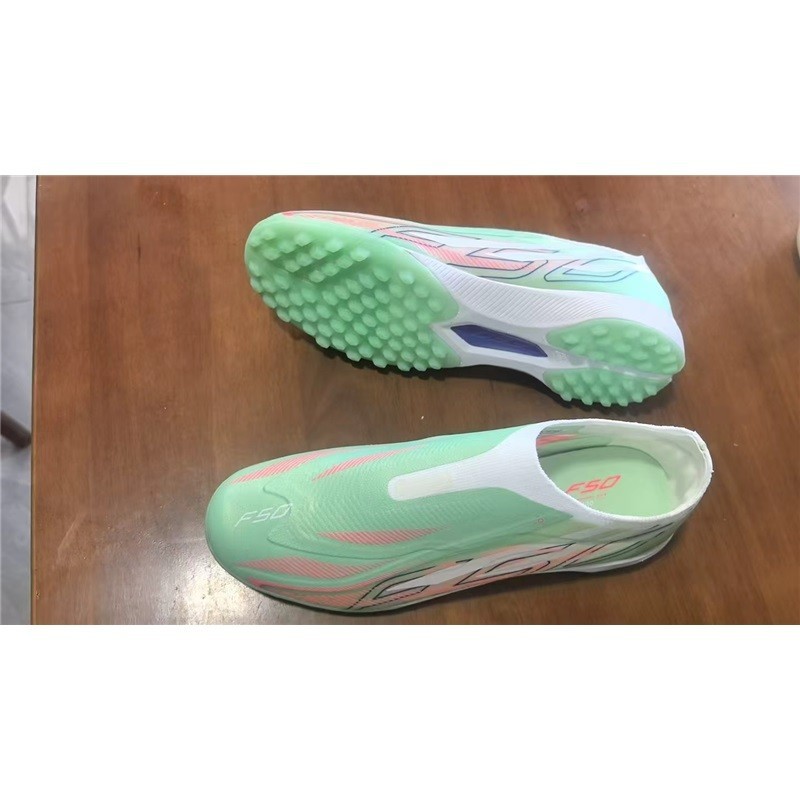 รองเท้าฟุตบอล F50 HYPERFAST ELITE LL TF สไตล์ไร้ลูกไม้ป้องกันการลื่นและทนต่อการสึกหรอ จัดส่งฟรี
