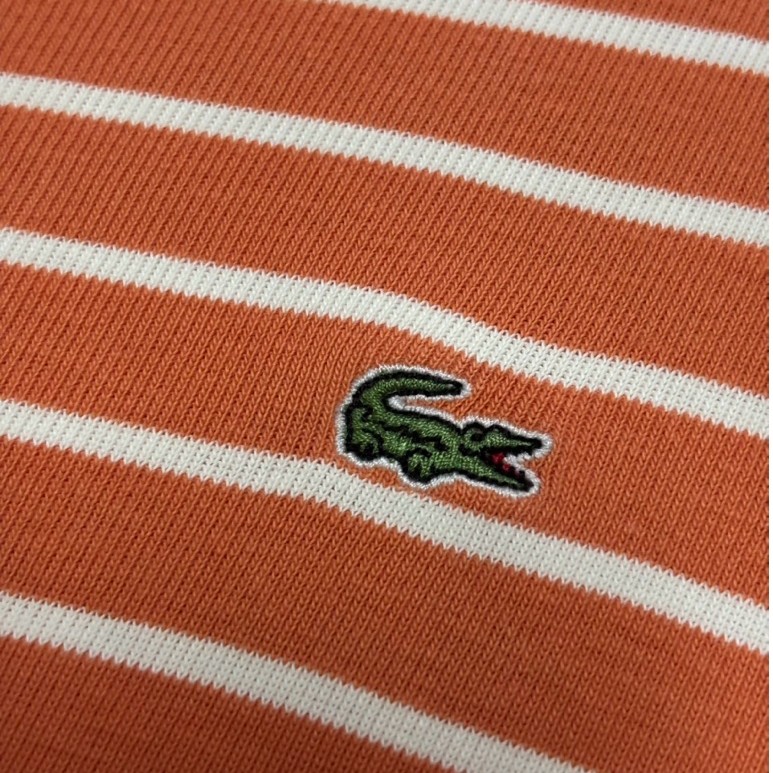 Lacoste แท้ สภาพดี เสื้อแขนยาว เสื้อมินิมอลสีส้มอิฐลายเส้นขาว อก38-40นิ้ว