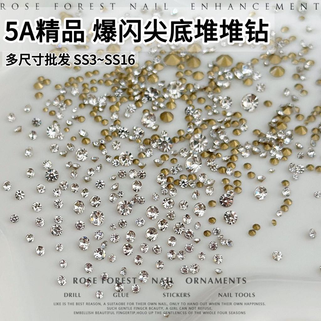 5ก พรีเมี่ยมกระพริบโปร่งใสสีขาวชี้ด้านล่างซ้อนเพชรแต่งเล็บเครื่องประดับเย็บเพชรกลมเล็กเล็บเพชรเครื่องประดับขายส่ง