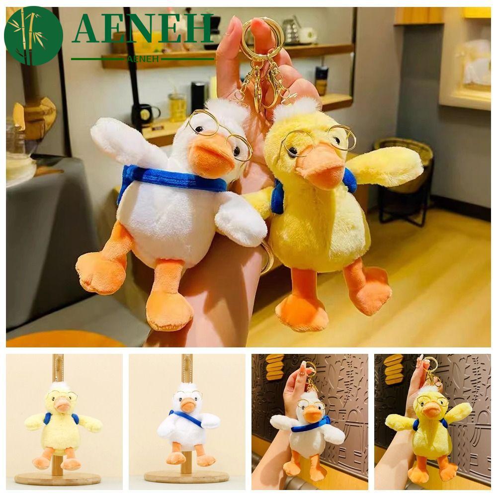 เอเนห์ พวงกุญแจเป็ดสีเหลือง แว่นตาจําลอง หน้าผ้าฝ้ายนุ่ม จี้การ์ตูน