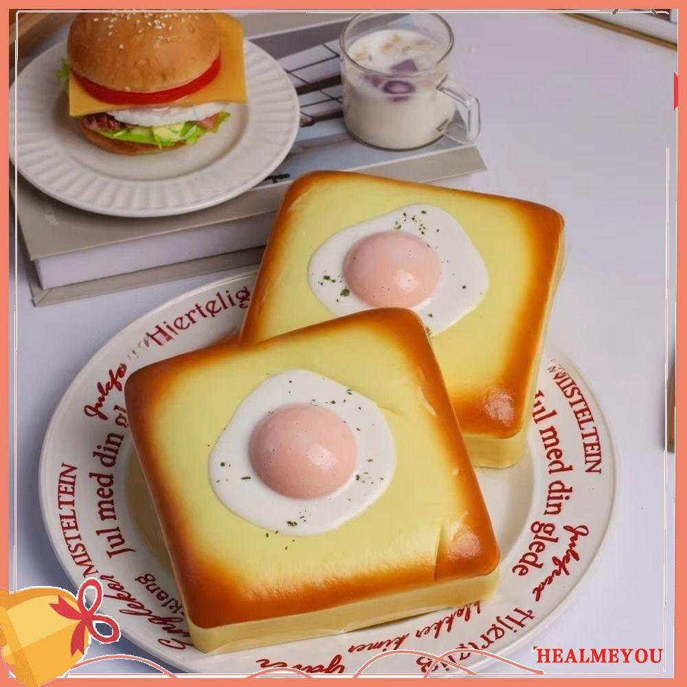 สกุชชี่ขนมปังปิ้งไข่ดาวน้ํา, โฟมที่เพิ่มขึ้นช้าบีบขนมปังของเล่น, มือสร้างสรรค์ผ่อนคลายหยิกสมจริงสกุชชี่ขนมปังปิ้งเด็กผู้ใหญ่