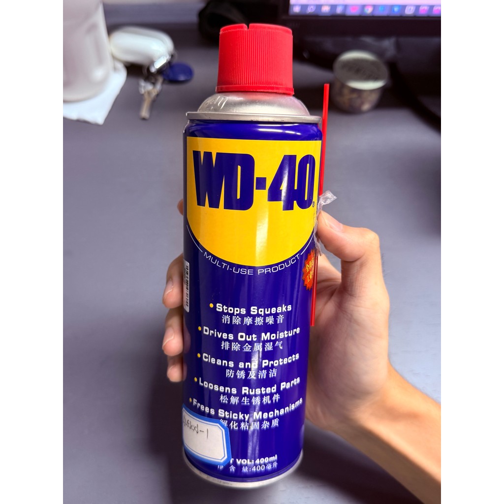 WD-40 น้ำมันอเนกประสงค์ ขนาด400 มล.ใช้สำหรับหล่อลื่น คลายติดขัด ไล่ความชื่น ทำความสะอาด และป้องกันสนิม สีใส ไม่มWD-40