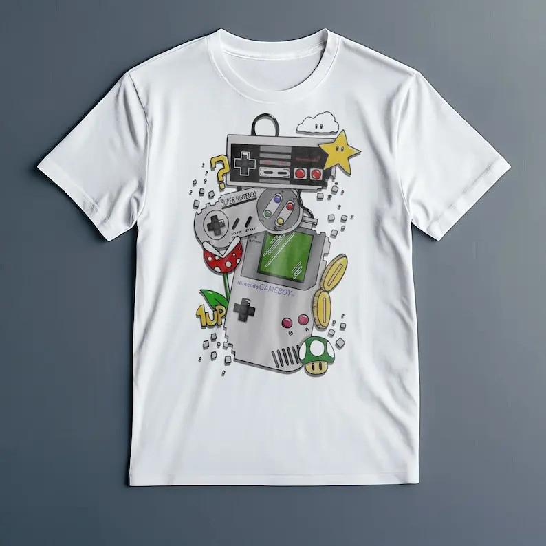 เสื้อยืดผ้าฝ้ายนุ่มลายพิกเซลสไตล์เรโทรเกมบอยยุค 90 สำหรับทุกเพศ ของขวัญสำหรับเกมเมอร์วินเทจ เสื้อยืด