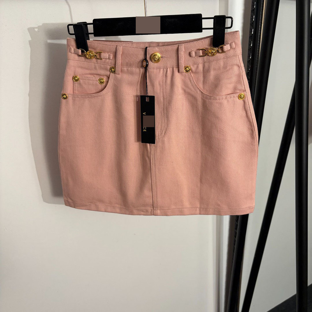 YV8I VER/S Gold buttoned, hip-hugging, waist-slimming denim mini skirt