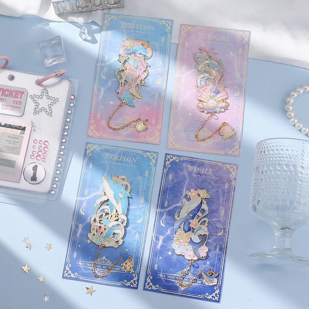 1PC Ocean Creature ที่คั่นหนังสือโลหะ , แมงกะพรุน, ปลาวาฬ & Dolphin Designs พร้อมโซ่ทอง & Mini Charms สําหรับคนรักหนังสือ &