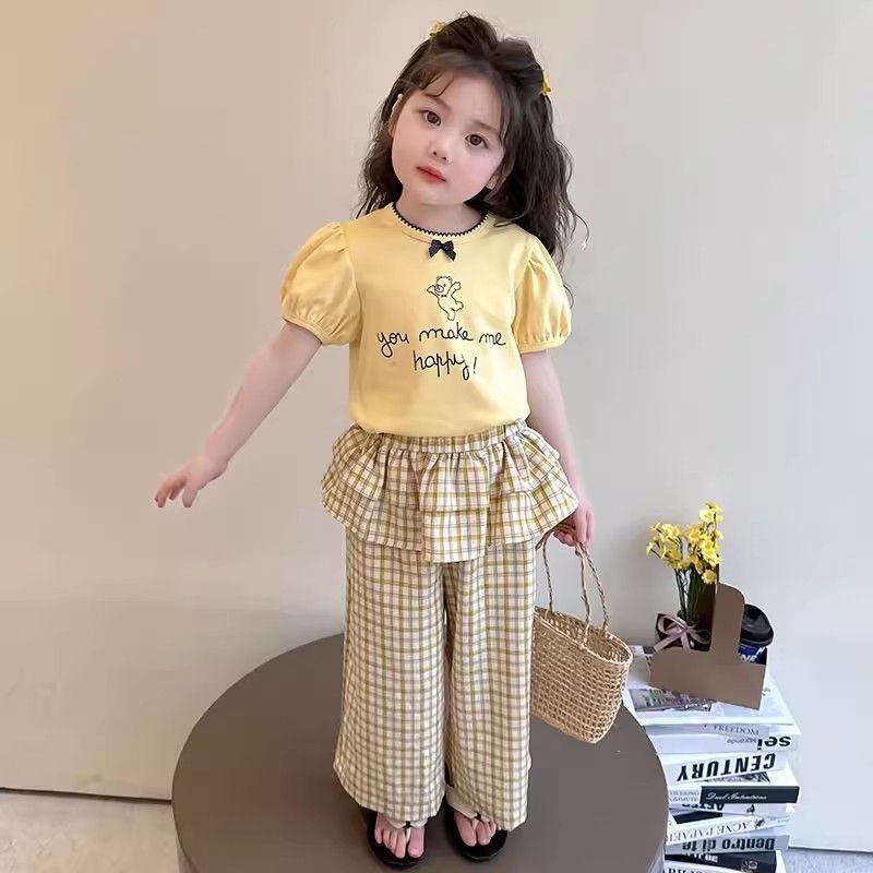 2026 ชุดเด็กผู้หญิงฤดูร้อนใหม่ | เสื้อยืดการ์ตูน + กางเกงขากว้าง Ruffle Hem ชุด 2 ชิ้น