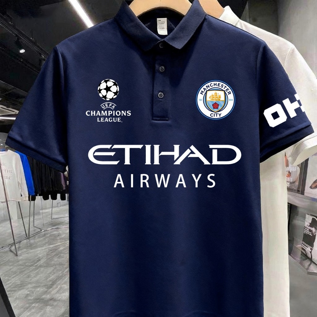 เสื้อโปโล เสื้อแมนเชสเตอร์ ซิตี้ UEFA Champions League ทีมฟุตบอล Fan jersey Manchester City FC Polo shirt S-3XL UnisexSi