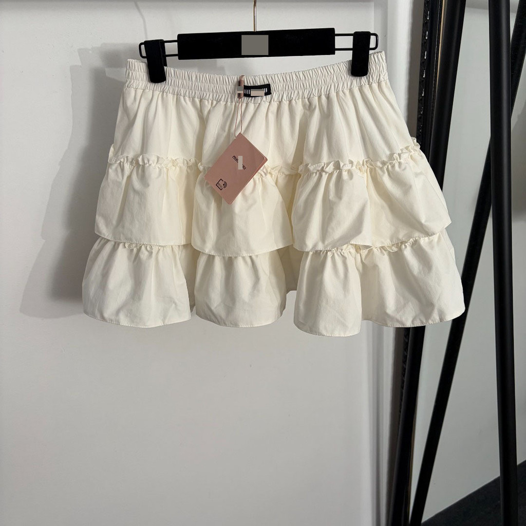 M1u Temperament Slim-fit High-End Wear Sweet Style Dopamine Temperament Cake กระโปรง Hem ขนาดเล็กกระ