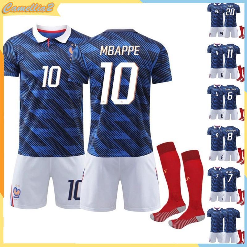 ลูกเบี้ยว 2026 ชุดฟุตบอล เสื้อฟุตบอลบ้านฝรั่งเศสสําหรับผู้ชายและผู้หญิงเสื้อยืดกางเกงขาสั้นและถุงเท้าฟุตบอลของขวัญส่วนบุคคล