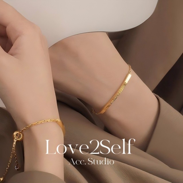 Love2selfS088 กันน้ํา Non Tarnish สแตนเลสสตีลสร้อยข้อมือผู้หญิงดึงสตริงปรับสร้อยข้อมือแกะสลัก "LOVER DREAM" แฟชั่นเครื่องประดับ